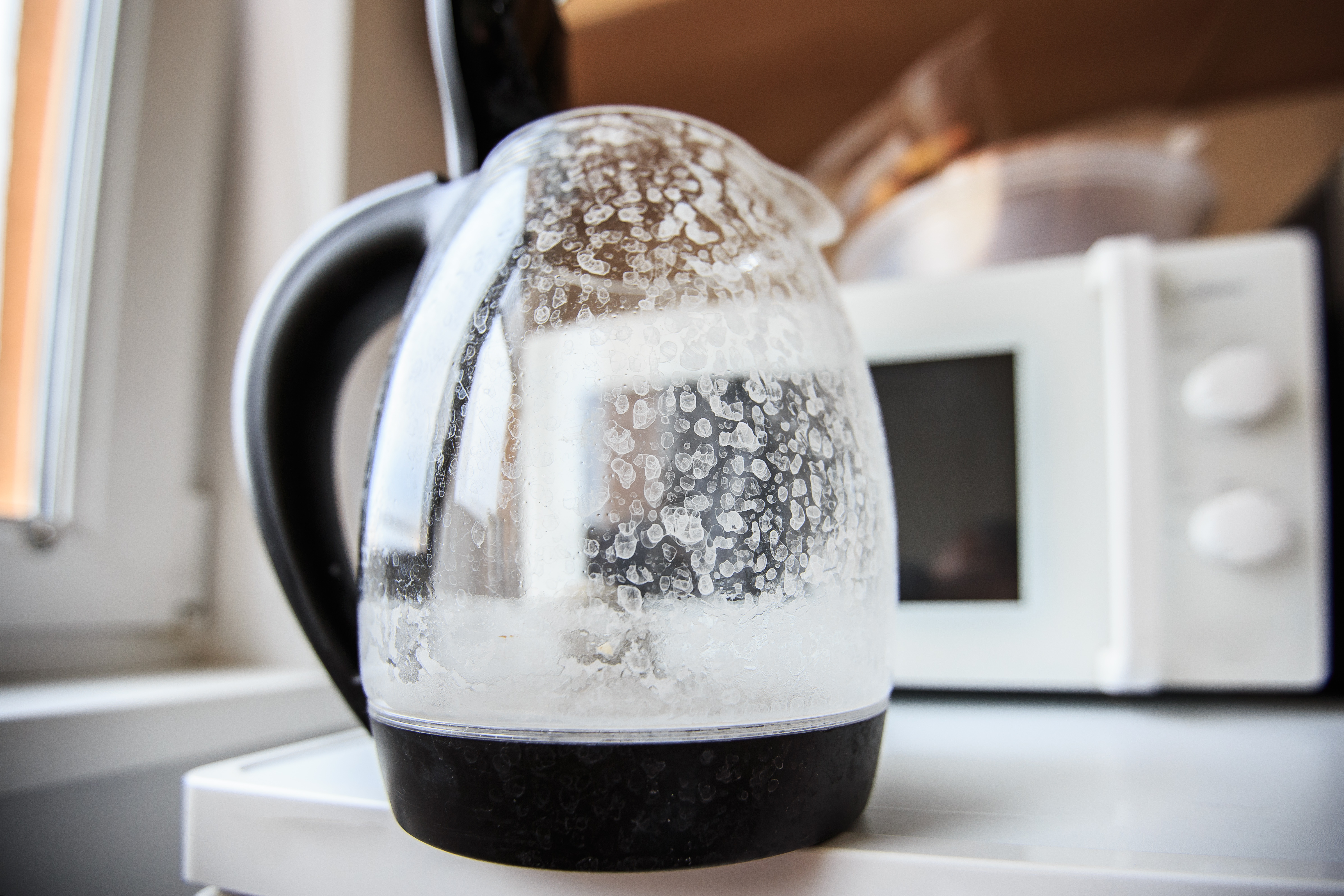 Hard water stains on a coffee pot - to answer the question do I need a water softener in Cleveland, contact WyattWorks today.