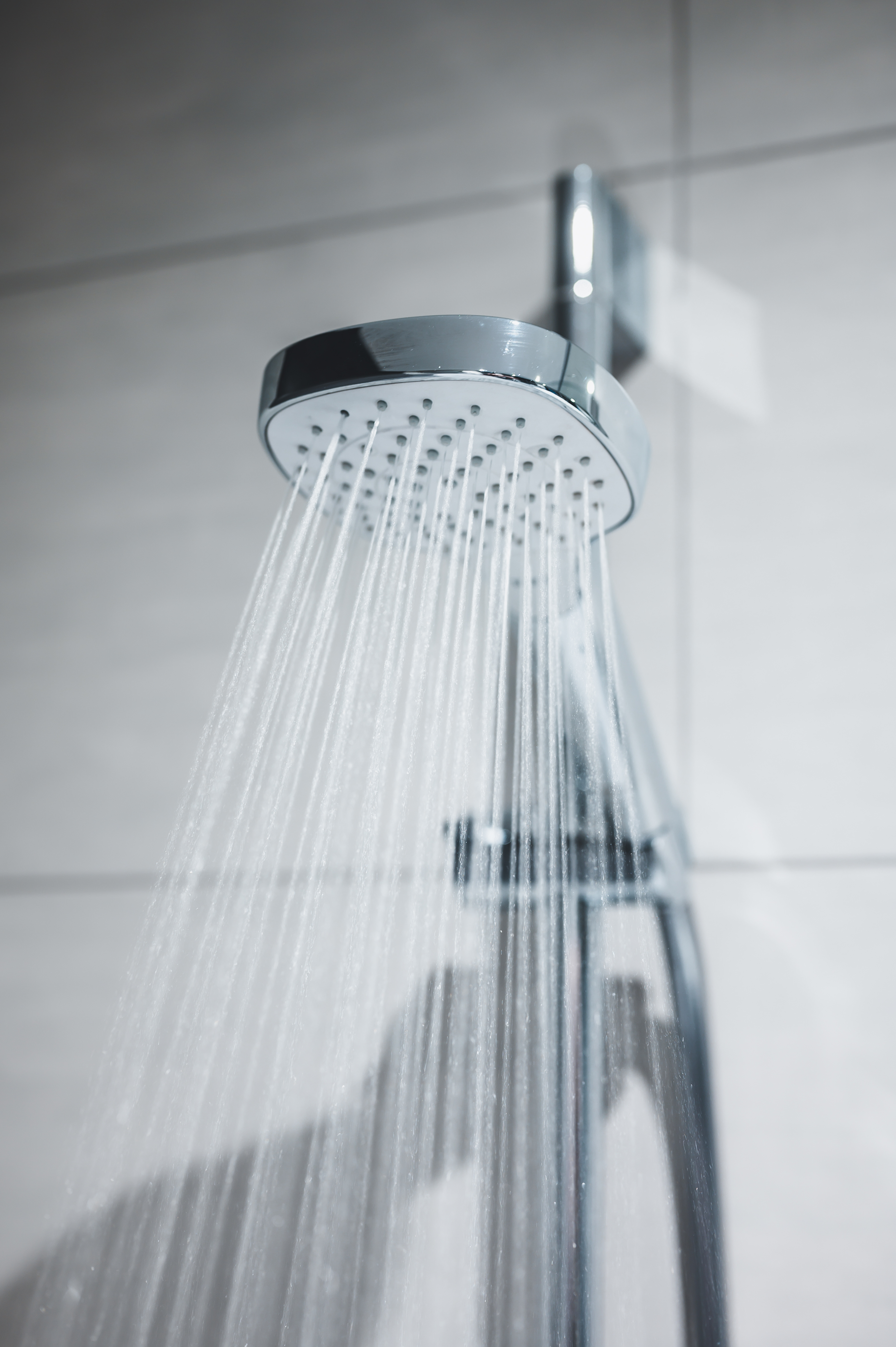 A clean shower head with soft water in Cleveland.