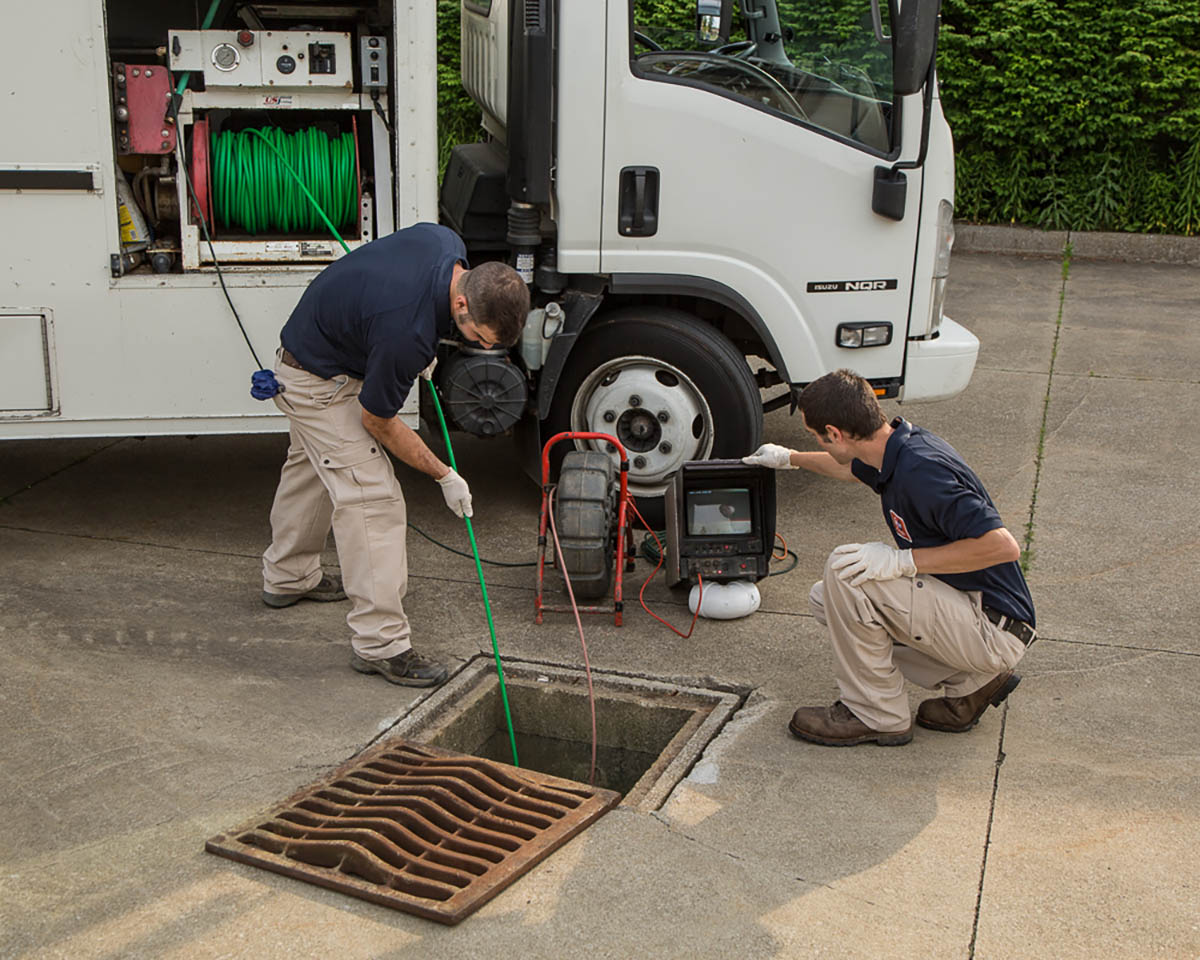 WyattWorks service pros doing what they do best - plumbing.
