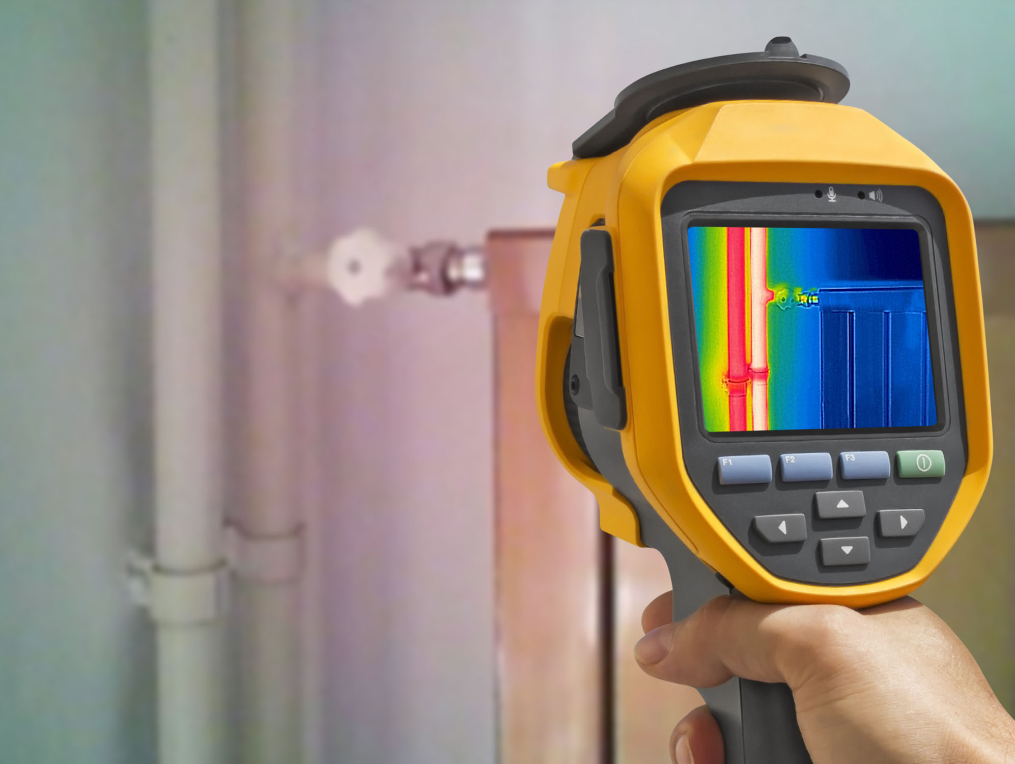 A WyattWorks employee using infrared Cleveland, OH leak detection.