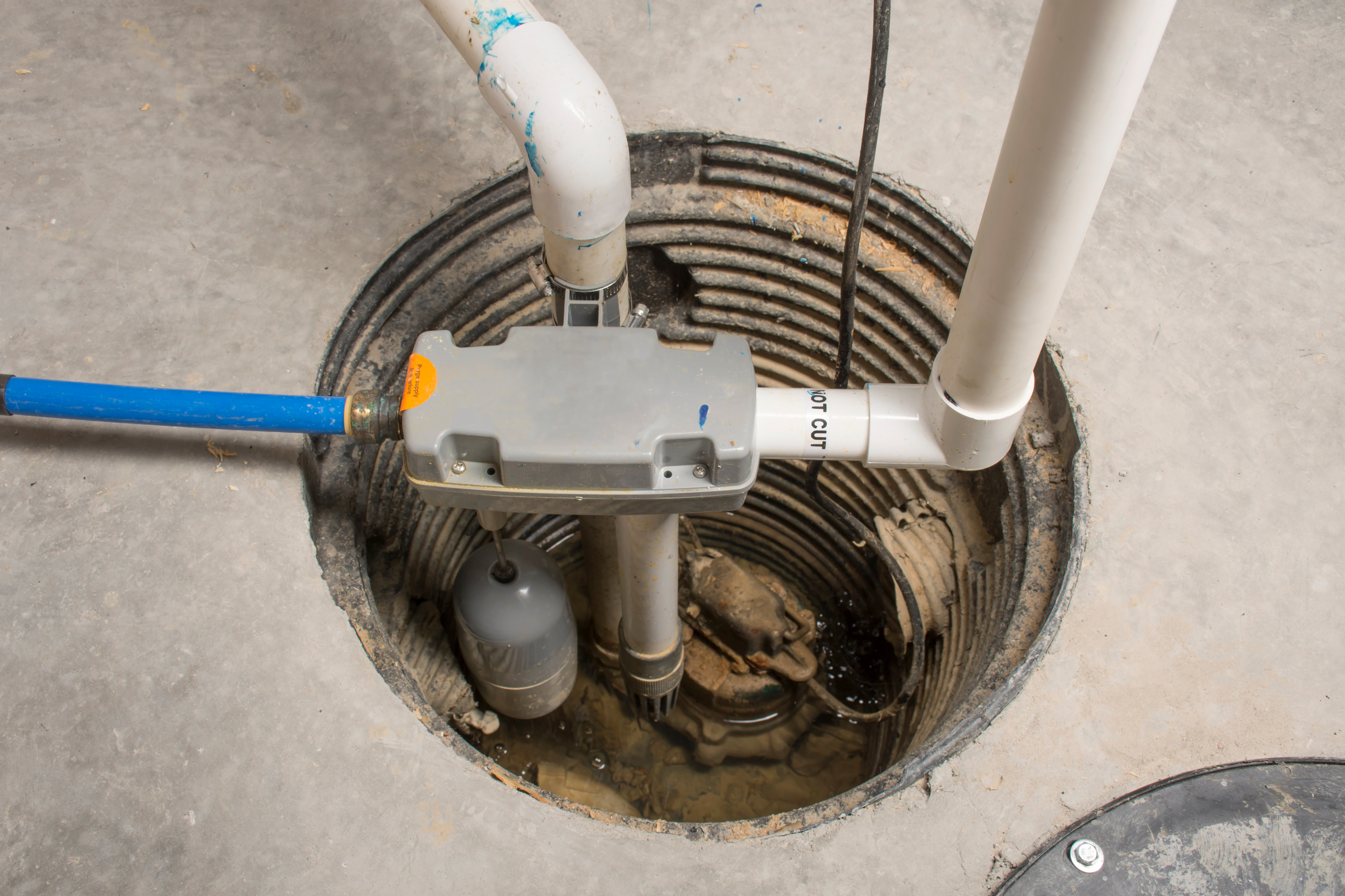 A WyattWorks service provider working on a plumbing truck.