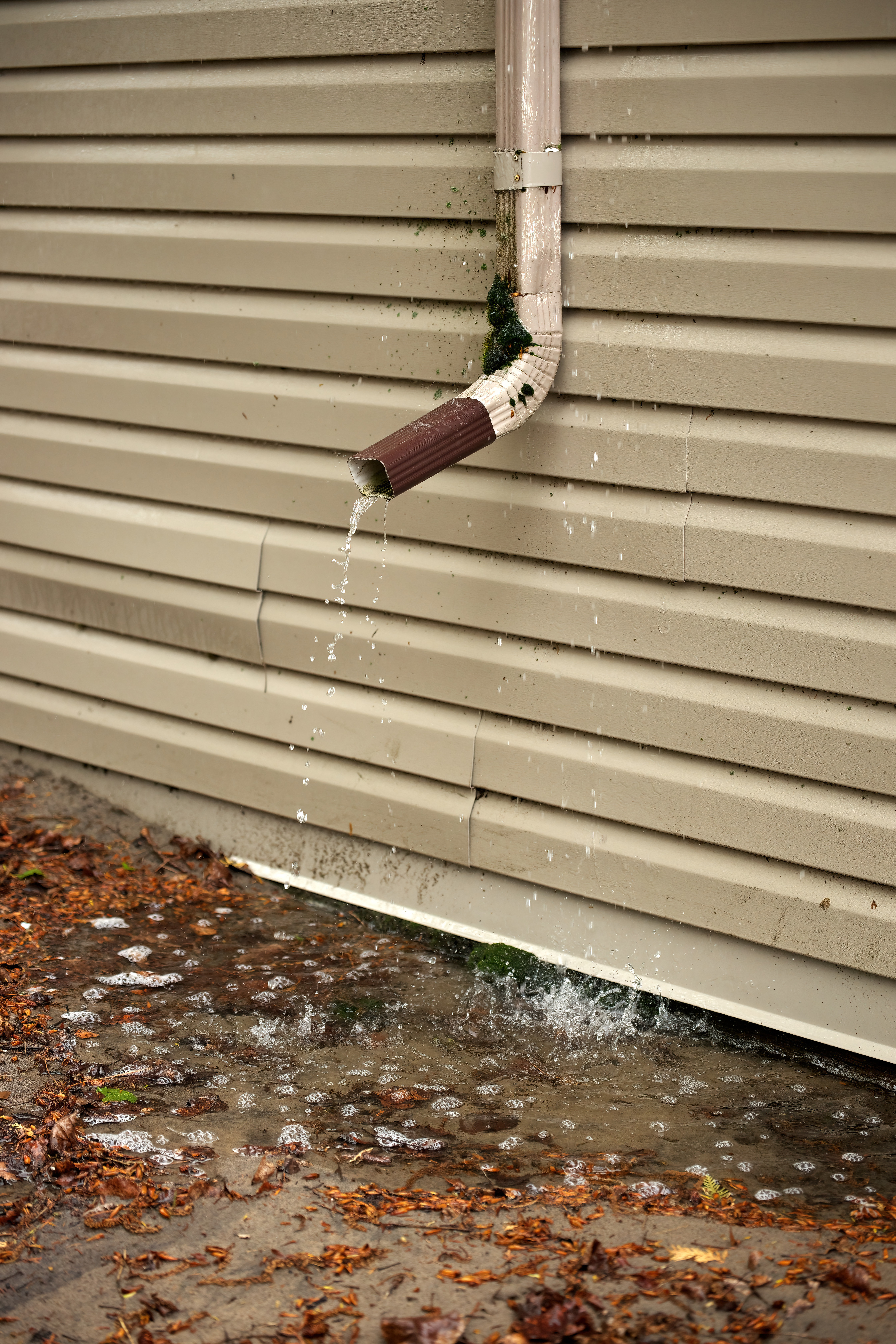 A home water drain leaking into the basement - contact WyattWorks in Ohio & North Carolina to avoid your sump pump malfunctioning.