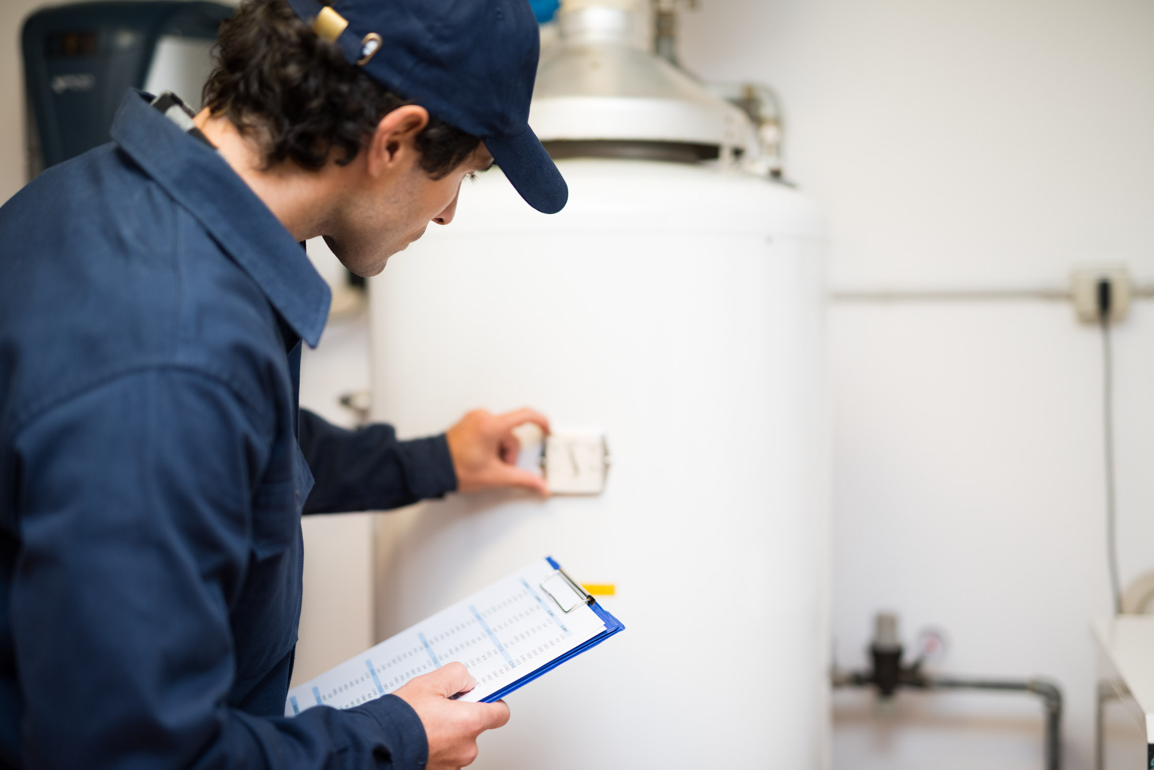 A WyattWorks employee providing Cleveland, OH water heater repairs.