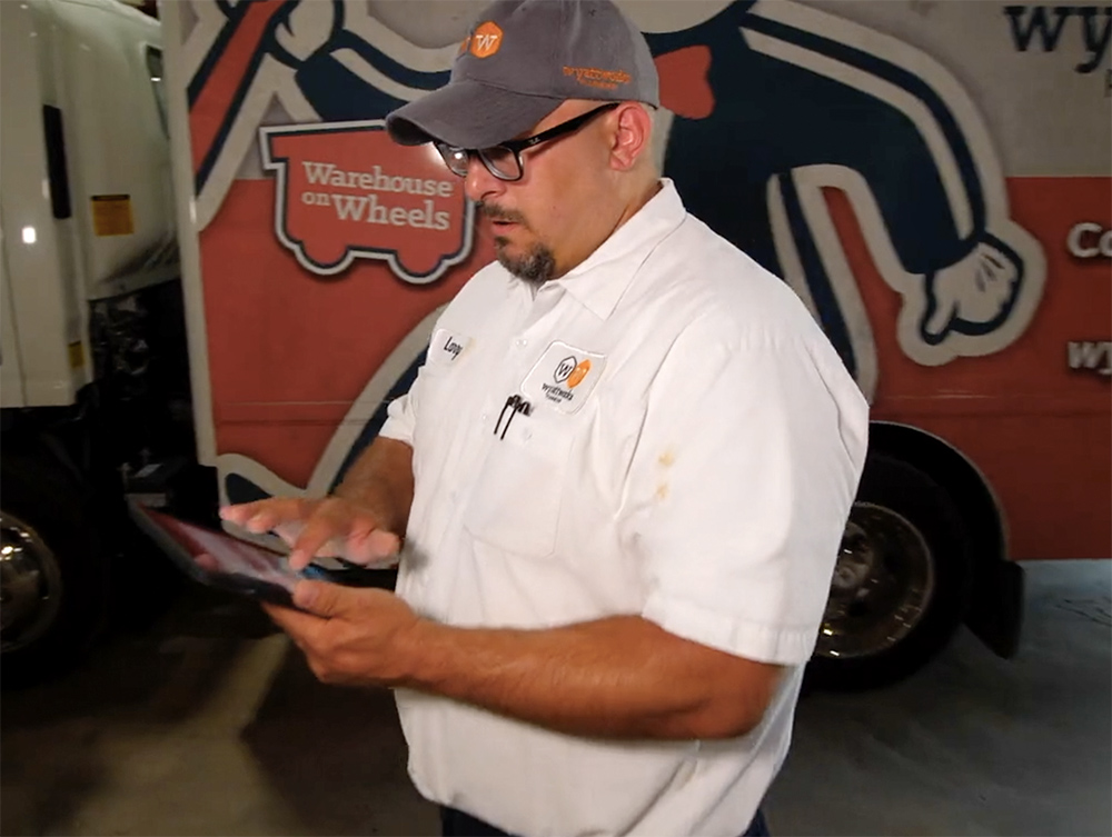 A WyattWorks service pros walking outside, call us today for your water softener repairs in Cleveland, OH.